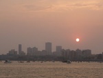 on the boat sunset over Mumbai