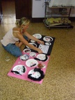 Rachel displaying childrens pictures at the lighthouse